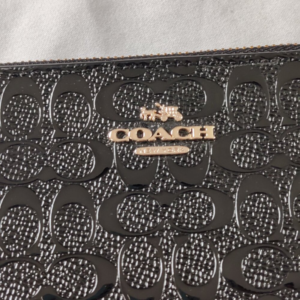 *SOLD* Coach Signature Debossed Leather Corner Zip Wristlet in BLACK